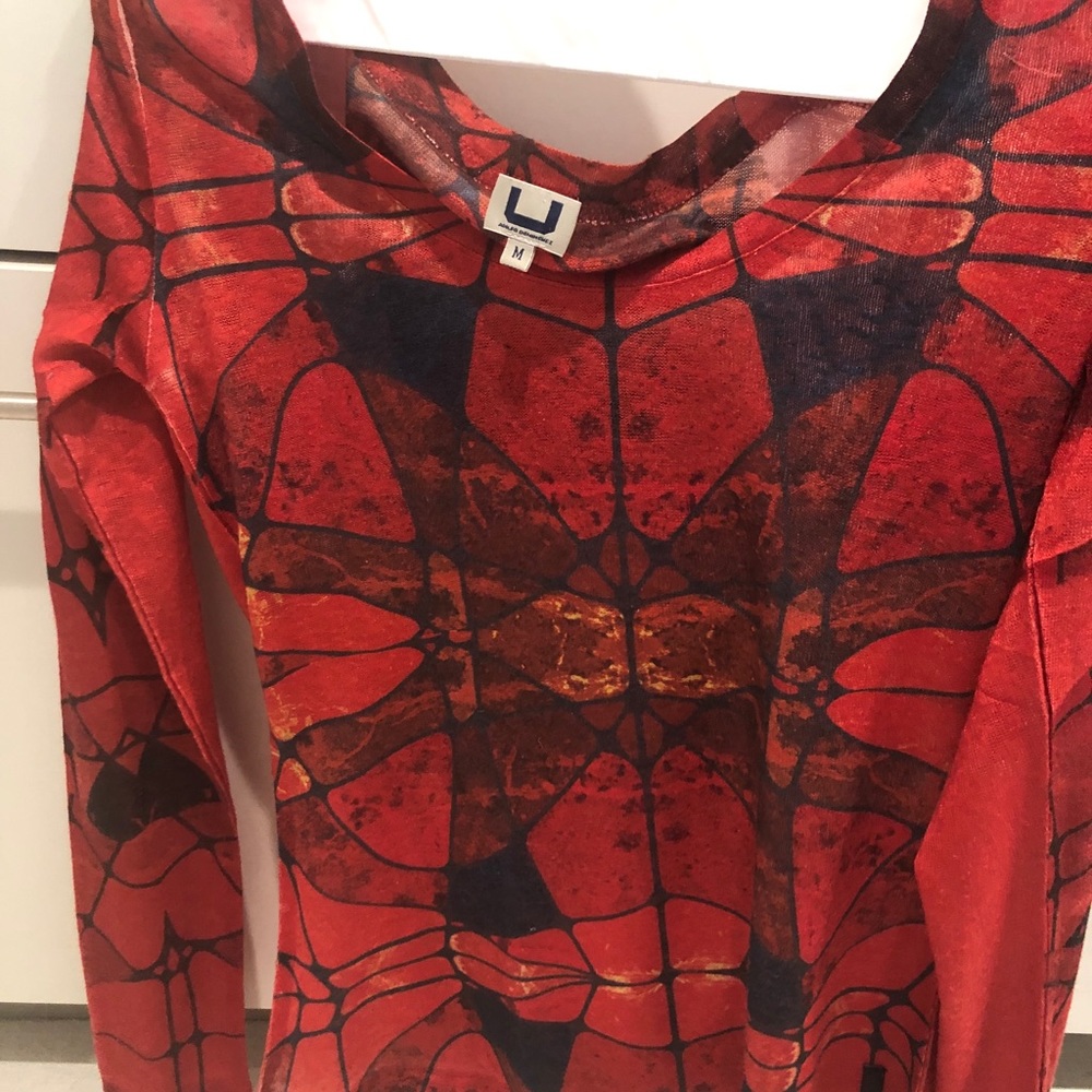 M Adolfo Domingues Top